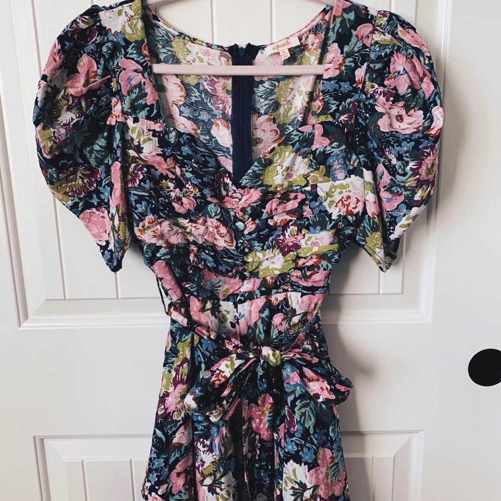 A Peach puff sleeve romper